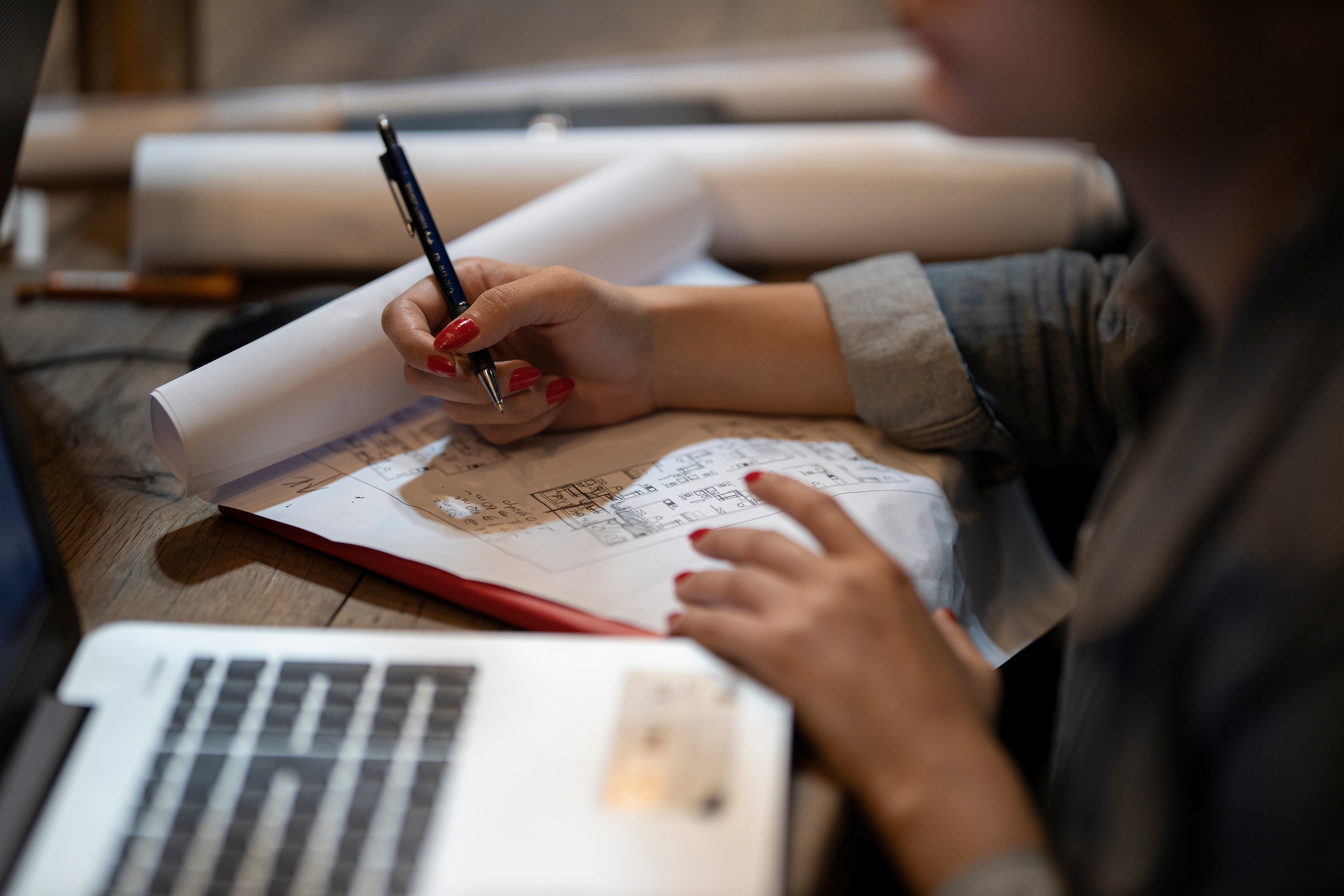 Woman Writing on Paper